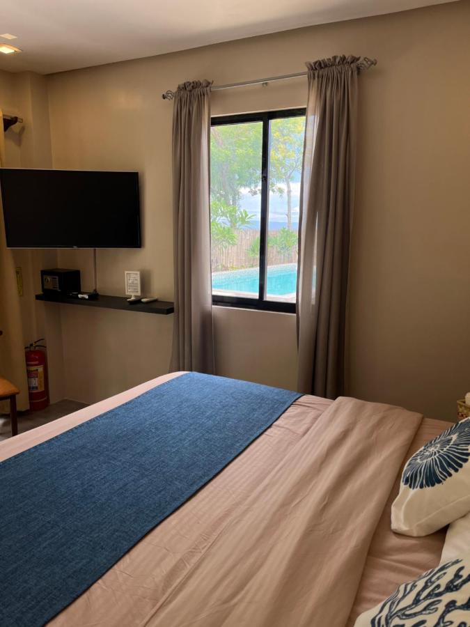 Southseas Beach Resort And Dive Center Santander Eksteriør bilde